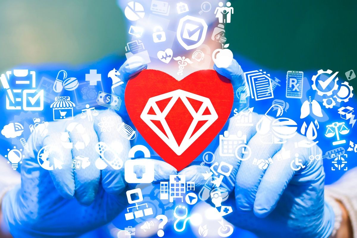 Doctor offers a red heart with diamond icon on a virtual panel. Brilliance medical help service. Perfect Hospital Work. Excellent VIP Medicine. Pharmaceutical health care premium quality concept.